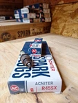 (8)'NOS AC-R45SX Spark Plugs W/green Rings.gm #5613564.MADE Usa. Fixed Price $70.00.