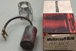 New Genuine Motorcraft Ford DCC-32 Ignition Condenser W/ Clamp. Fixed Price $9.45.