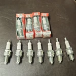 Nos/open Box Champion N9Y S-60923 Spark Plug Lot Of 11, 4 Missing Caps. Fixed Price $80.00.