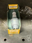 K-12G Champion Spark Plug New. Fixed Price $13.95.
