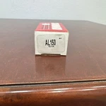Standard Distributor Rotor AL150. Fixed Price $14.36.