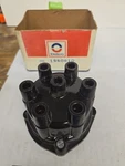 New Genuine Delco Remy 1960810 Distributor Cap Cylinder. Fixed Price $10.00.