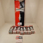 Two New Old Stock, Champion, Spark Plugs J12Y. Fixed Price $34.80.