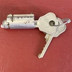 1930 's Ford Mercury Lock Cyinder W/ Hurd Keys. Fixed Price $34.99.