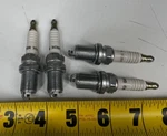 Pack Of 4) Champion 980 Lawn/garden V-power Spark Plugs 14MM Thread XC92YC Mower. Fixed Price $11.16.
