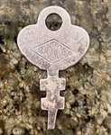 Vintage/antique Silver Flat Stamped Basco Key. Approx. 1 3/8". Fixed Price $8.00.