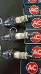Vintage Nos Ac Delco R-45-NS Green Strip Spark Plugs 398-10. Fixed Price $35.00.