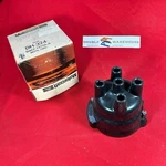 Nos Oem Ford Motorcraft DH-324 D4ZZ-12106-A Distributor Cap. Fixed Price $17.99.