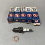 Lot Of Nos Ac 45NS Fire Ring Spark Plugs Gm. Fixed Price $30.00.