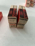 4 Auto Light Spark Plugs, Ag 52. Fixed Price $15.00.