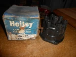 Vintage Nos Holly Brand Distributor Cap For 6 Cylinder Vehicles 30-13. Fixed Price $8.20.