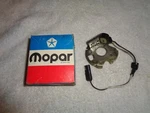 Nos Mopar 1972-75 6 Cylinder Distributor Pickup And Plate. Fixed Price $39.00.