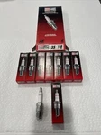 8 New Champion RV12C6 Copper Plus Spark Plugs Stock Number 35. Fixed Price $15.00.