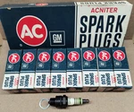 8 R46 5569994 Green Ring Spark Plugs Acniter. Fixed Price $49.99.