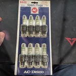 (8)....'NOS AC-R44T Spark Plugs W/green Rings.....gm #5569993.....MADE Usa. Fixed Price $40.00.