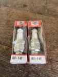 2 Nos Champion RF-14Y Spark Plugs. Fixed Price $7.85.
