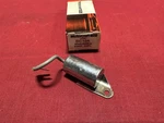 Nos 1957-1974 Ford Mercury DC-13A C9AZ-12300-A Distributor Condenser. Fixed Price $9.00.